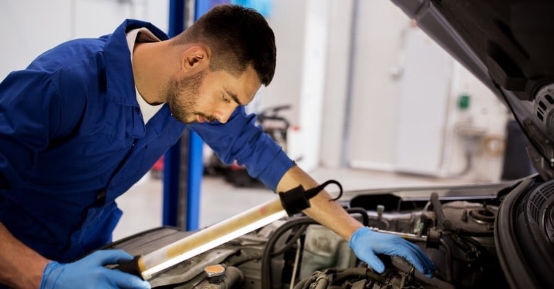Mechanic Working on a Car- Auto Mechanic Services