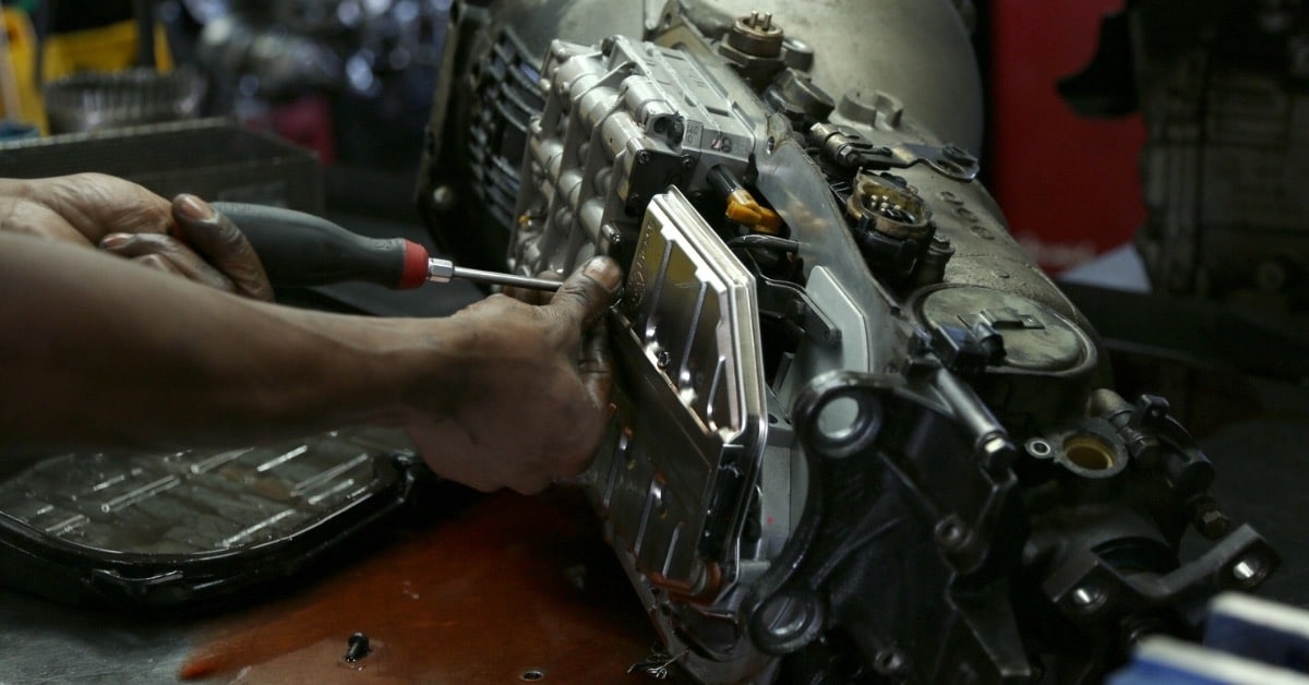 Experienced Mechanic at Ace Auto Repair Fixing Transmission Leak